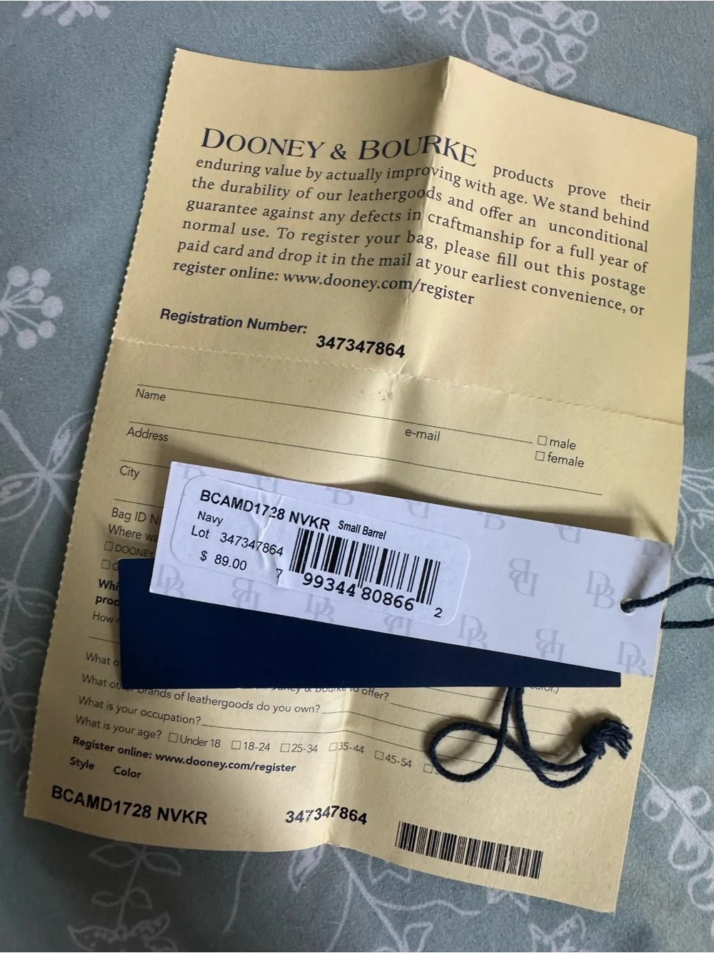 Dooney & Bourke Navy and Brown Leather-Trim Wristlet with Pink Zip